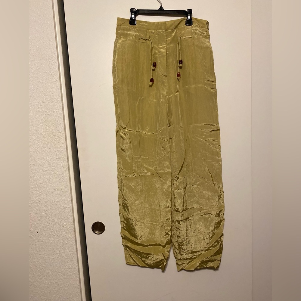 GANNI $595
Crinkled satin tapered pants dusty yellow size 36 size 0 - Picture 6 of 12